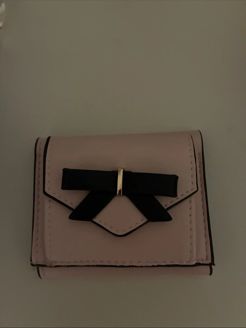 Claire's Light Pink Wallet with Black Bow and Gold Accent